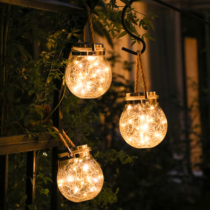Solar LED Laterne im Glas – Dekorative Gartenbeleuchtung mit Drahtlichtern und Tragegriff