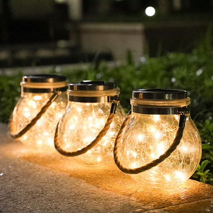 Solar LED Laterne im Glas – Dekorative Gartenbeleuchtung mit Drahtlichtern und Tragegriff